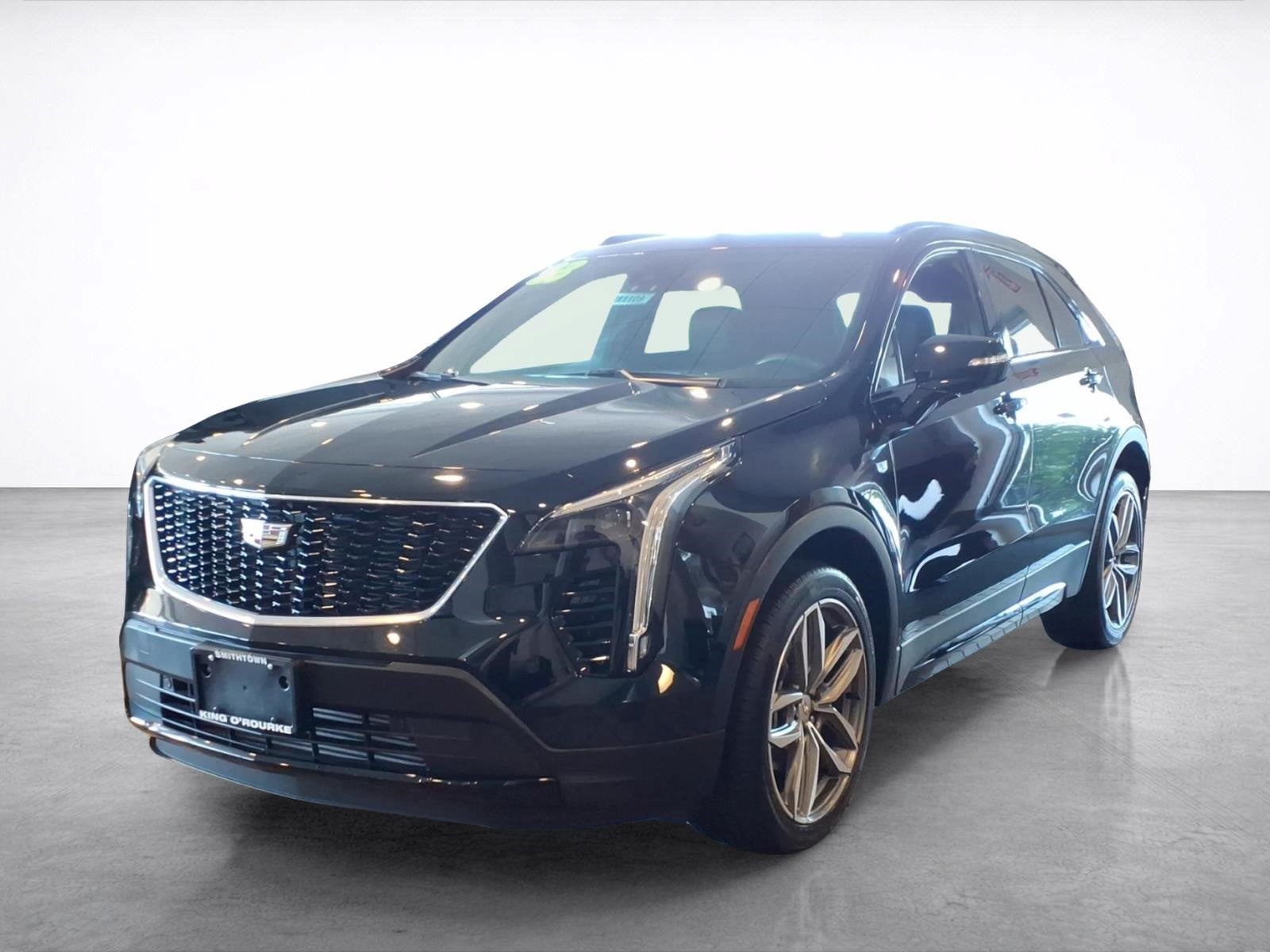 2023 Cadillac XT4 Sport in Stellar Black Metallic — front three-quarter view