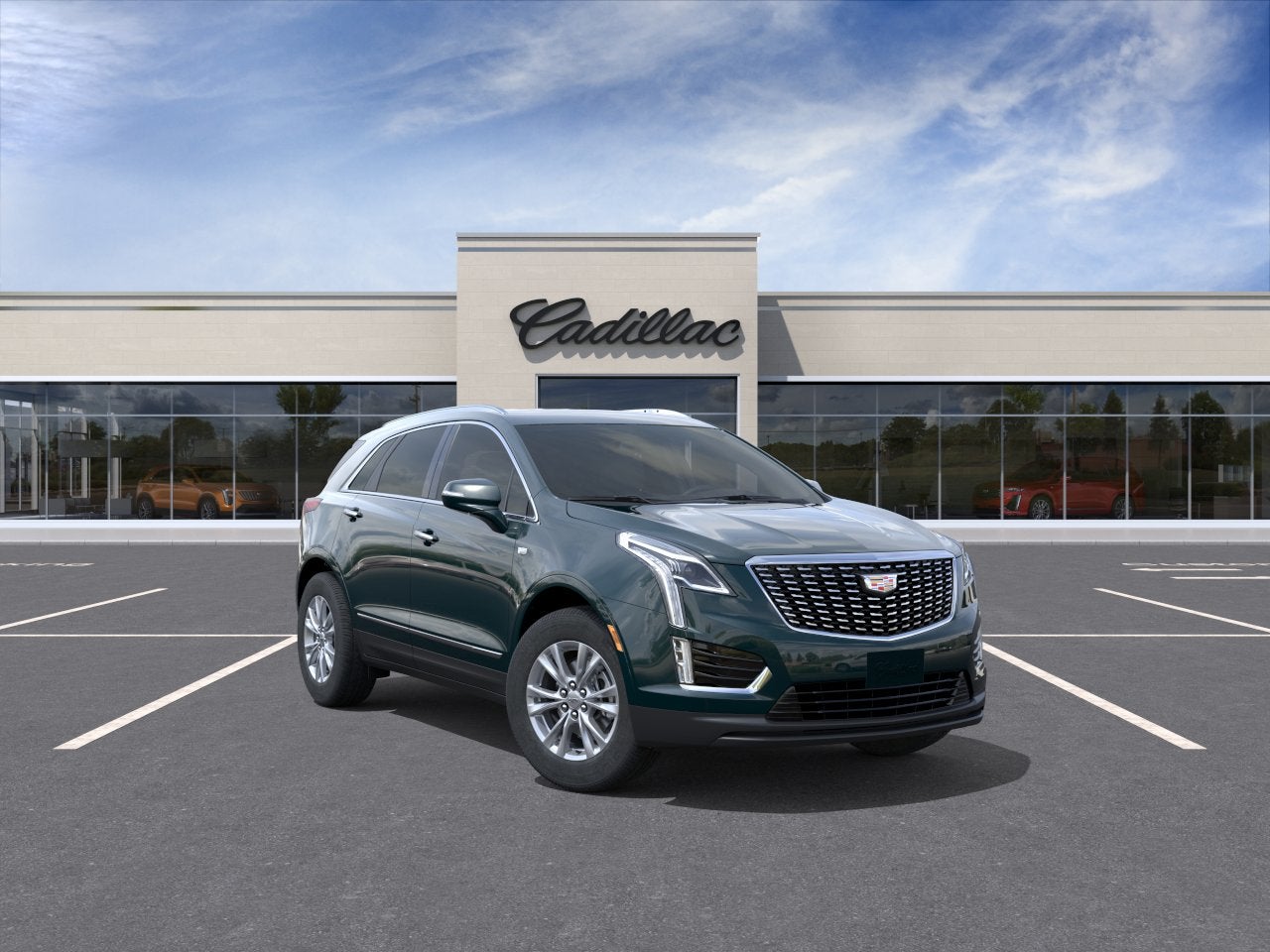 2026 Cadillac XT5 Luxury in Emerald Lake Metallic — front three-quarter view