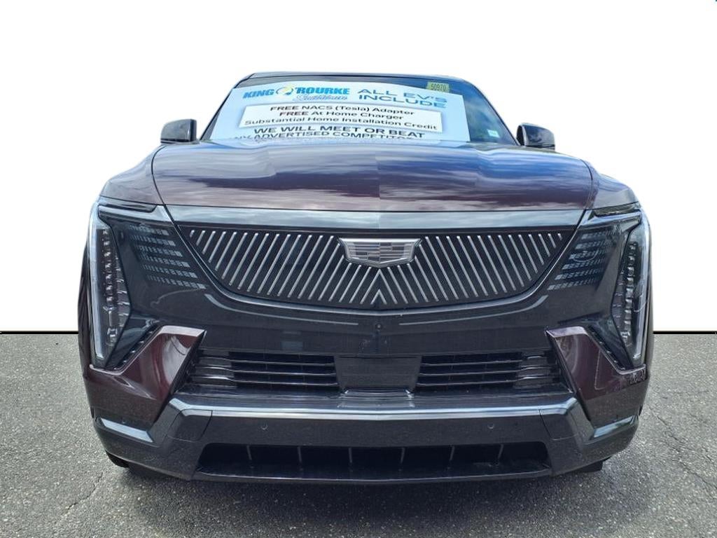 2025 Cadillac ESCALADE IQ Sport 1 in Black Cherry Tintcoat — front three-quarter view
