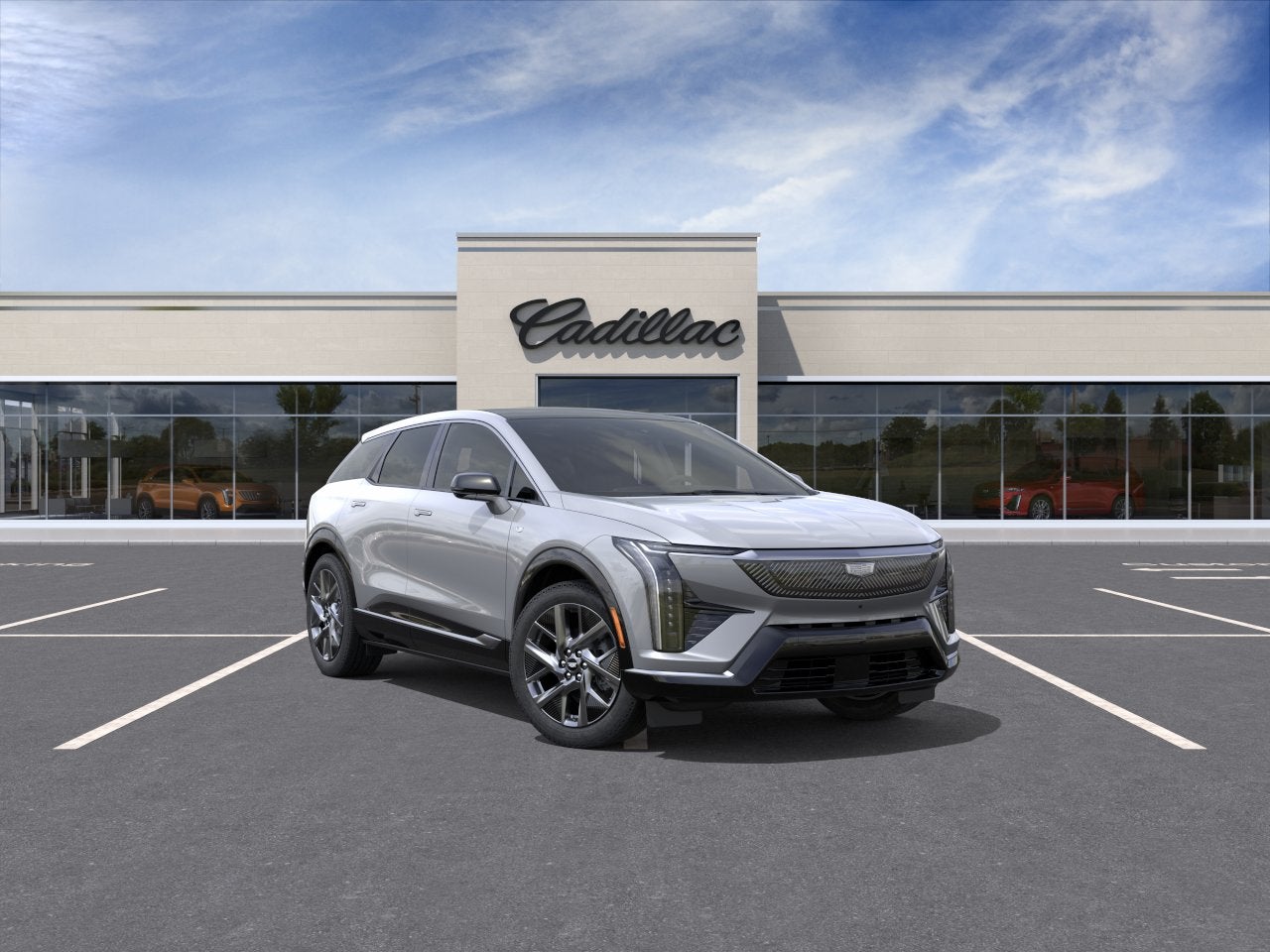 2027 Cadillac OPTIQ Luxury in Argent Silver Metallic — front three-quarter view