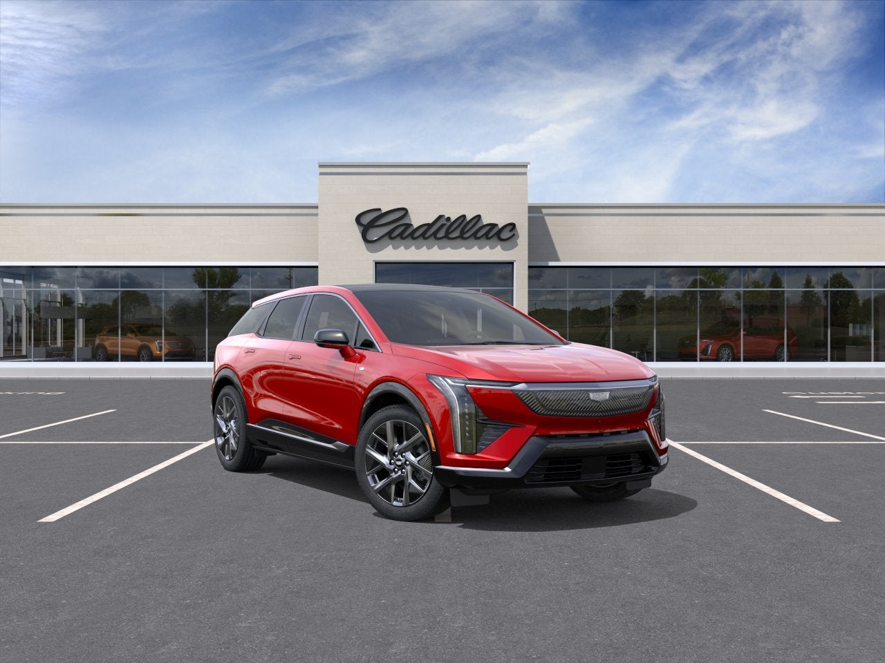 2027 Cadillac OPTIQ Luxury in Radiant Red Tintcoat — front three-quarter view