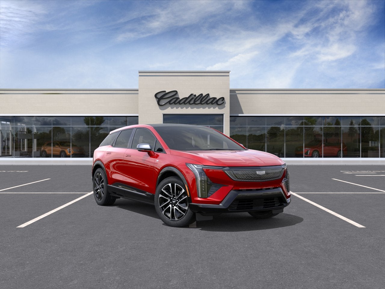2027 Cadillac OPTIQ Sport in Radiant Red Tintcoat — front three-quarter view